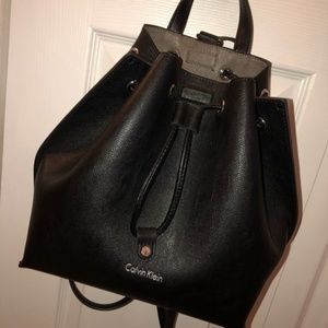 Calvin Klein backpack with wristlet inside!